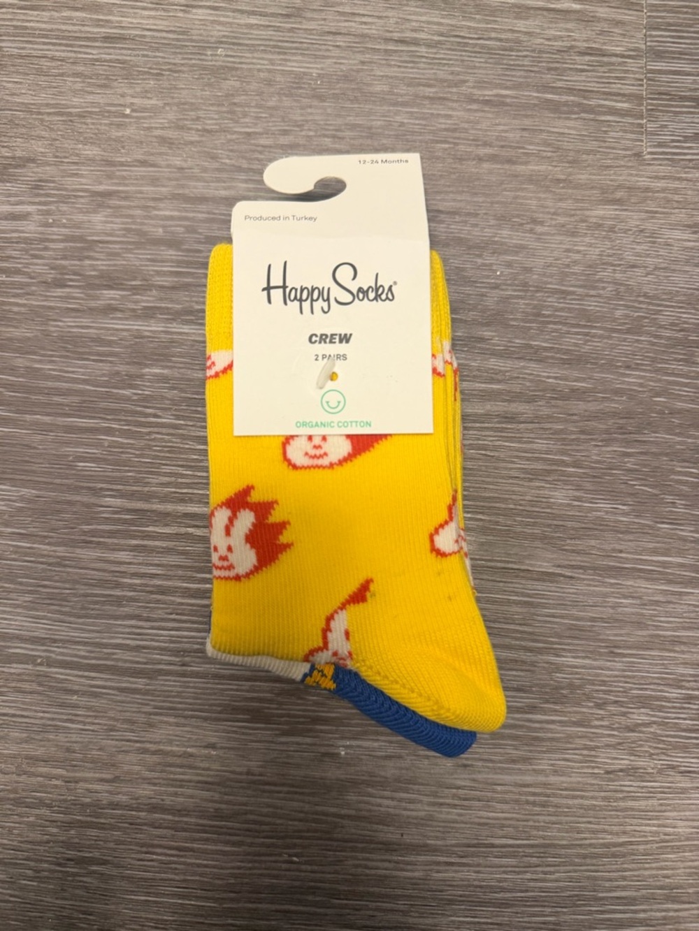 Happy Socks Yellow Crew Socks with Red Cartoon Faces and Blue Toe